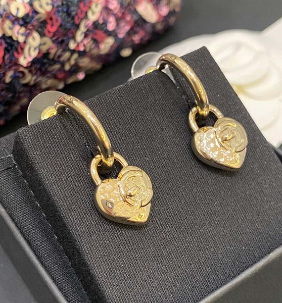 luxury quality charm drop earring heart shape padlock in 18k gold plated have box stamp ps7297a, Golden
luxury quality charm drop earring heart shape padlock in 18k gold plated have box stamp ps7297a, Golden