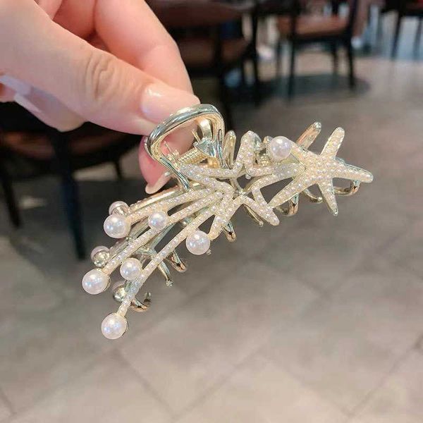 korean fashion pentagonal star pearl medium size grab clip net red back of head curling shark clip simple hairpin, Golden;silver
korean fashion pentagonal star pearl medium size grab clip net red back of head curling shark clip simple hairpin, Golden;silver