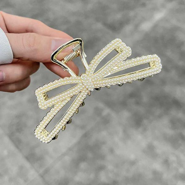 korean temperament pearl bow large grab clip high sense elegant hairpin net red fashion back head shark clip, Golden;silver
korean temperament pearl bow large grab clip high sense elegant hairpin net red fashion back head shark clip, Golden;silver