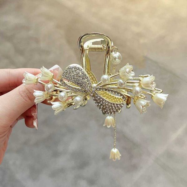 ancient elegant bell orchid tassel large grab clip fashionable bowknot pearl hairpin shark clip, Golden;silver
ancient elegant bell orchid tassel large grab clip fashionable bowknot pearl hairpin shark clip, Golden;silver