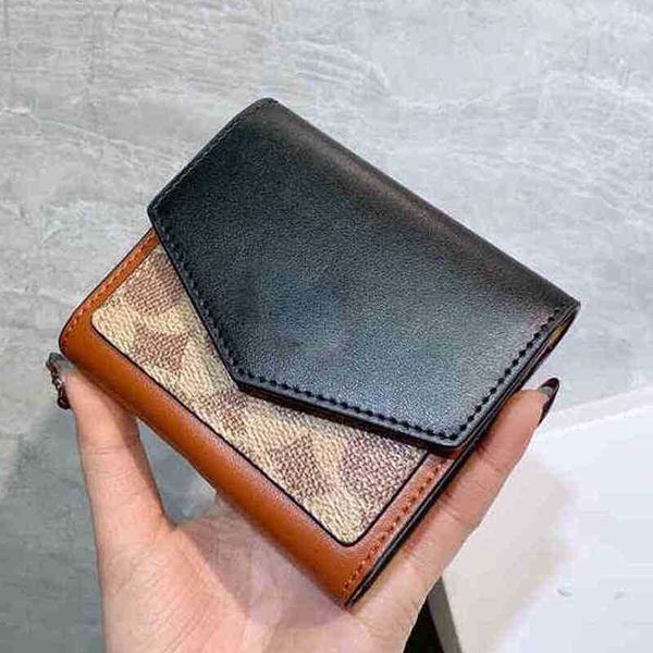 totes embossing leather wallets bags women designer short printing retro ins student folding buckle zero classic female purses 1010
totes embossing leather wallets bags women designer short printing retro ins student folding buckle zero classic female purses 1010