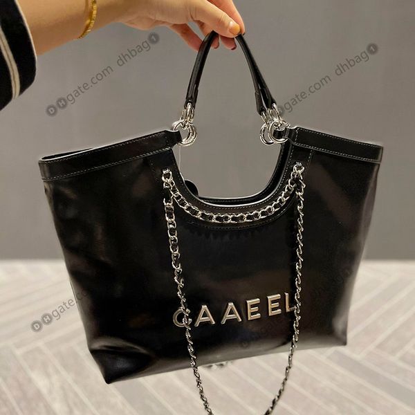 ladies vintage large capacity designer underarm bags cowhide silver letters shopping tote classic black brown luxury handbags leather handle
ladies vintage large capacity designer underarm bags cowhide silver letters shopping tote classic black brown luxury handbags leather handle