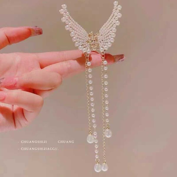 hair clips new fashion tassel pearl butterfly clip high sense half tie head temperament curling headdress, Golden;silver
hair clips new fashion tassel pearl butterfly clip high sense half tie head temperament curling headdress, Golden;silver