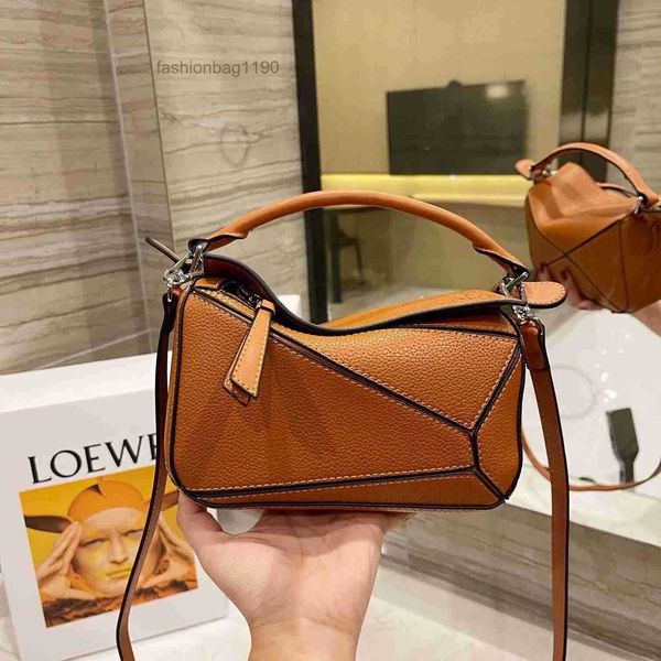 2023 women designer handbags bag loews female cowhide geometric portable single large capacity dazhong mini akz8 p 6ht3
2023 women designer handbags bag loews female cowhide geometric portable single large capacity dazhong mini akz8 p 6ht3