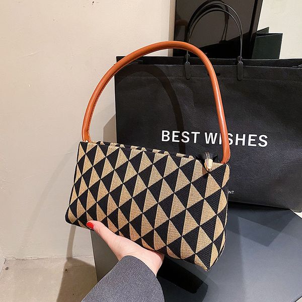 fashion triangle checked one shoulder underarm bag fall 2022 new niche simple versatile bag
fashion triangle checked one shoulder underarm bag fall 2022 new niche simple versatile bag