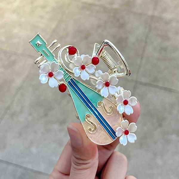 hair clips chinese fashion flower pearl pipa medium grab clip high sense oil dripping shark back head, Golden;silver
hair clips chinese fashion flower pearl pipa medium grab clip high sense oil dripping shark back head, Golden;silver