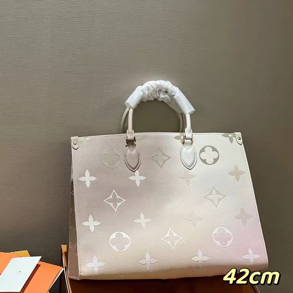 luxurys purses designer woman handbag totes bags onthego shouder crossbody bag genuine leather ladies handbags spring in the city rising lar 
luxurys purses designer woman handbag totes bags onthego shouder crossbody bag genuine leather ladies handbags spring in the city rising lar