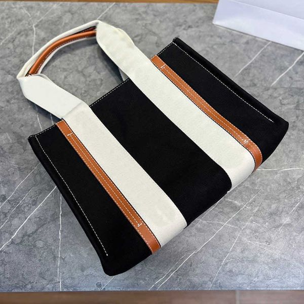 designer totes classic tote bags women handbag shoulder canvas luxury designer brand crossbody female shopping handbags 220324
designer totes classic tote bags women handbag shoulder canvas luxury designer brand crossbody female shopping handbags 220324