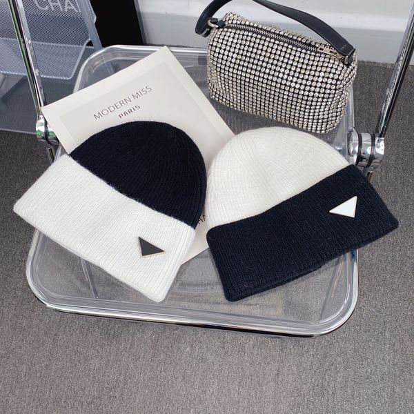 women designer beanie couple warm woolen knitted hat in autumn and winter fashion black and white splice metal triangle letter bonnet, Blue;gray
women designer beanie couple warm woolen knitted hat in autumn and winter fashion black and white splice metal triangle letter bonnet, Blue;gray
