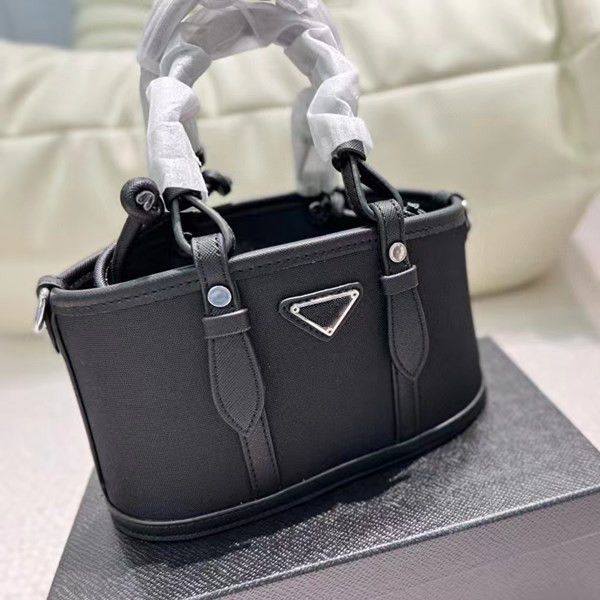 handbag 2022 new designer brand single shoulder bag women triangle logo pillow shape fashion tote bag
handbag 2022 new designer brand single shoulder bag women triangle logo pillow shape fashion tote bag