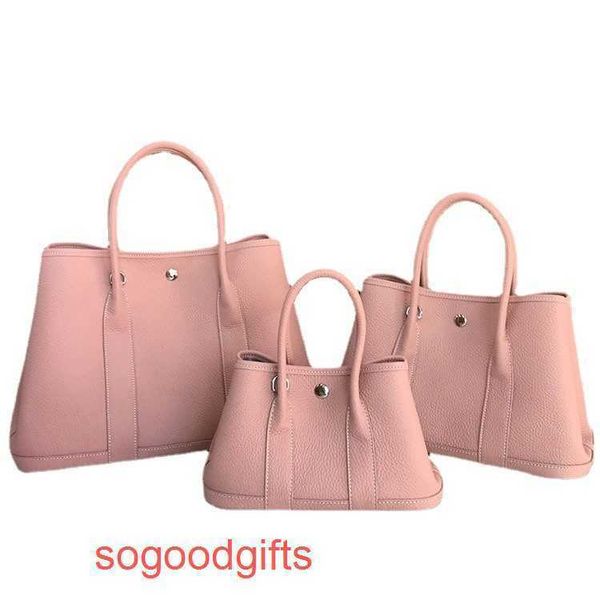 designer herme bag garden party s women crossbody tote handbags lychee grain layer cowhide garden bag simple large capacity porta 
designer herme bag garden party s women crossbody tote handbags lychee grain layer cowhide garden bag simple large capacity porta