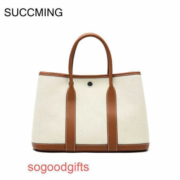 designer herme bag garden party bags women crossbody tote handbags large capacity canvas garden bag splicing contrast leather layer cow
designer herme bag garden party bags women crossbody tote handbags large capacity canvas garden bag splicing contrast leather layer cow