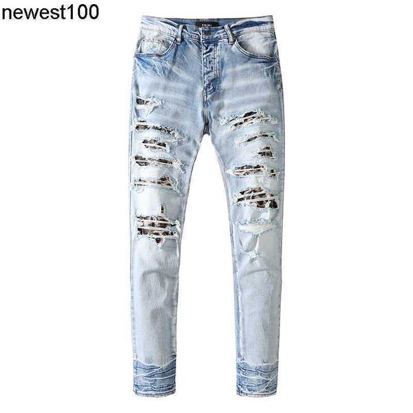 men's designer jeans amirs hole washing leopard patch pants young men's fashion slim fit jeans, Blue
men's designer jeans amirs hole washing leopard patch pants young men's fashion slim fit jeans, Blue