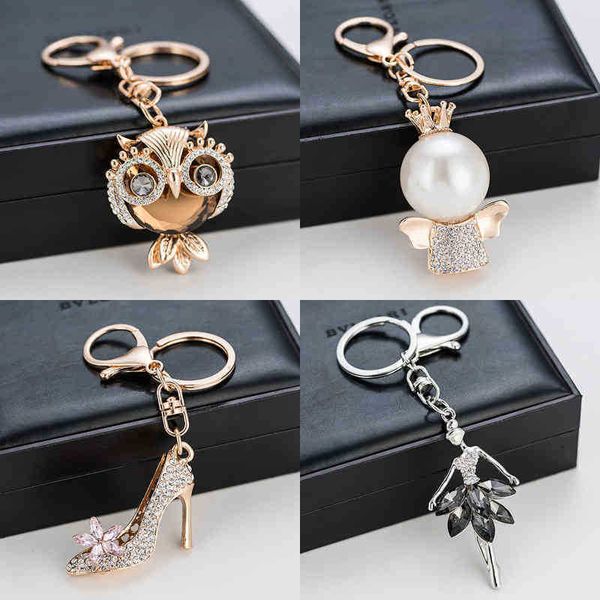 keychains new fashion cute creative crystal animal pearl bag buckle accessories car pendant metal key ring, Silver
keychains new fashion cute creative crystal animal pearl bag buckle accessories car pendant metal key ring, Silver