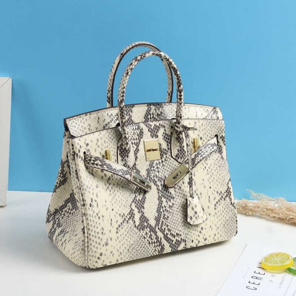 classic python bag real leather fashion atmosphere portable women s single shoulder spring tide
classic python bag real leather fashion atmosphere portable women s single shoulder spring tide