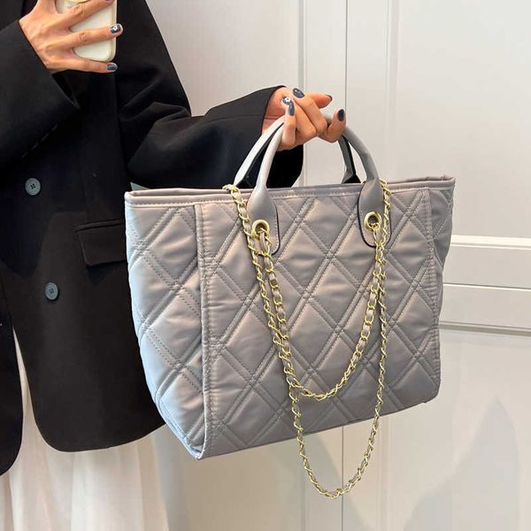 messenger bags female 2022 autumn and winter new chain shoulder large capacity tote
messenger bags female 2022 autumn and winter new chain shoulder large capacity tote