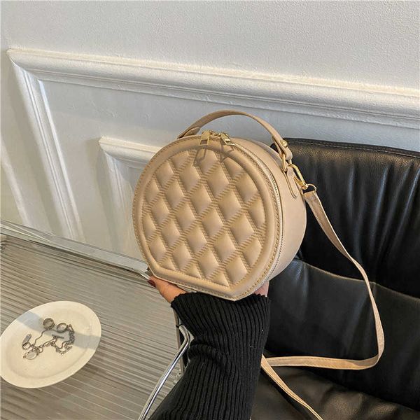 handheld small round bag female summer 2022 new popular and versatile texture messenger bag small crowd bag
handheld small round bag female summer 2022 new popular and versatile texture messenger bag small crowd bag