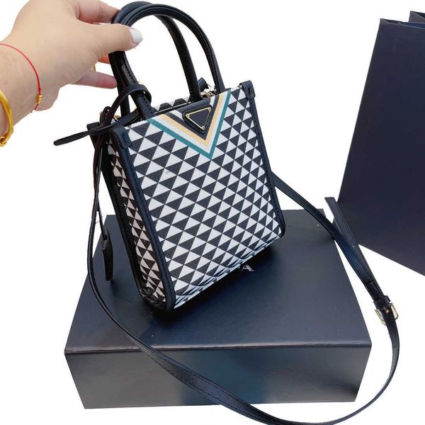evening bags classic symbole mini totes bags italy brand triangle sign crossbody bag fashion leather handle women handbags coin purse luxury
evening bags classic symbole mini totes bags italy brand triangle sign crossbody bag fashion leather handle women handbags coin purse luxury
