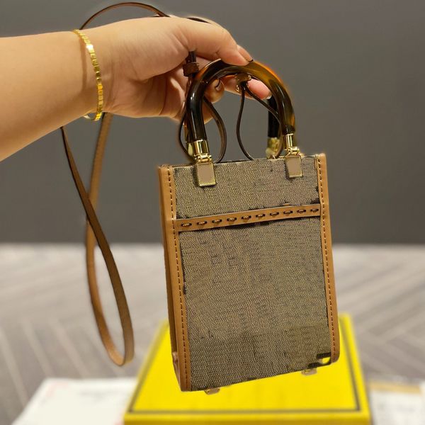 brown canvas mini totes handbags crossbody bags size17x22x5cm luxury designers women handle long strap shoulder hand bag purses fashion lady
brown canvas mini totes handbags crossbody bags size17x22x5cm luxury designers women handle long strap shoulder hand bag purses fashion lady