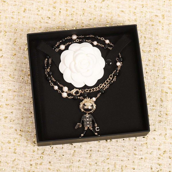 2022 luxury quality charm pendant necklace with doll design black enamel and diamond sweater chain have box stamp ps7348a, Golden
2022 luxury quality charm pendant necklace with doll design black enamel and diamond sweater chain have box stamp ps7348a, Golden