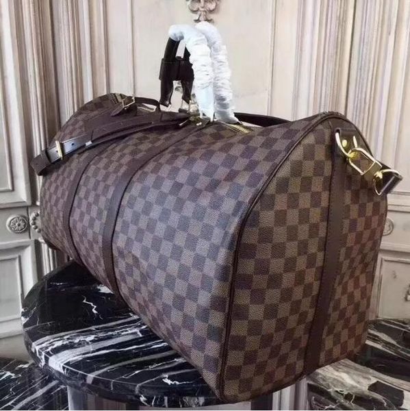 2022 luxury fashion men women highquality travel duffle bags brand designer luggage handbags with lock large capacity sport bag size 55cm
2022 luxury fashion men women highquality travel duffle bags brand designer luggage handbags with lock large capacity sport bag size 55cm