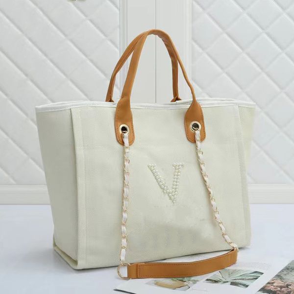 women tote bag canvas underarm bags pearl letter handbags classic l designer totes ladies wallet large capacity shoulder shopping bags
women tote bag canvas underarm bags pearl letter handbags classic l designer totes ladies wallet large capacity shoulder shopping bags