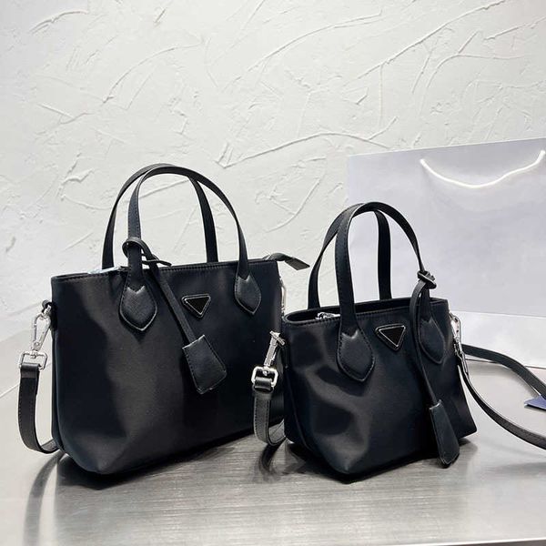 totes prabag tote bag women basket bag waterproof fabric shopping bags letter logo designer bags large capacity handbag black shoulder cross
totes prabag tote bag women basket bag waterproof fabric shopping bags letter logo designer bags large capacity handbag black shoulder cross