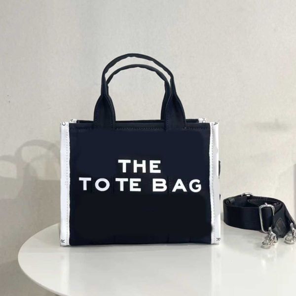 the tote bag marc totes bag designer women handbags all-match alphabet pattern shoulder crossbody three sizes 12 colors 220914
the tote bag marc totes bag designer women handbags all-match alphabet pattern shoulder crossbody three sizes 12 colors 220914