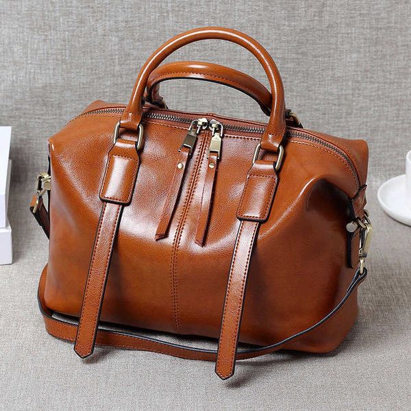 portable oil wax cowhide bag boston bag chao leather one shoulder messenger, Silver
portable oil wax cowhide bag boston bag chao leather one shoulder messenger, Silver