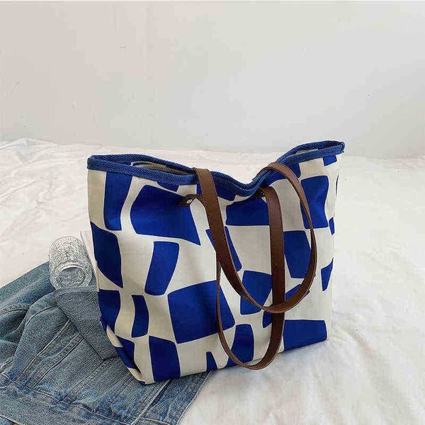 small square geometry large capacity canvas bag female one shoulder korean casual student ins tote bag 220516
small square geometry large capacity canvas bag female one shoulder korean casual student ins tote bag 220516