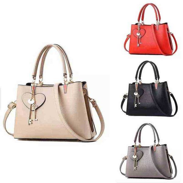 evening bag fashion korean ladies messenger large capacity love key solid color handbag female y220304
evening bag fashion korean ladies messenger large capacity love key solid color handbag female y220304