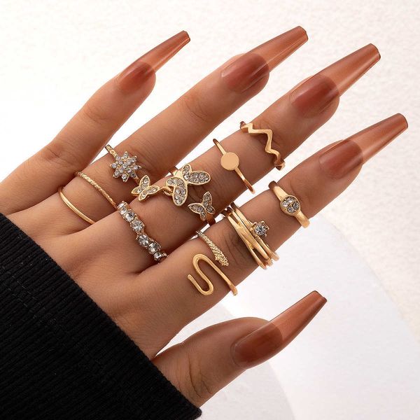 new sweet wind butterfly inlaid diamond snake shaped opening ring zodiac snowflake nine piece ring set, Silver
new sweet wind butterfly inlaid diamond snake shaped opening ring zodiac snowflake nine piece ring set, Silver