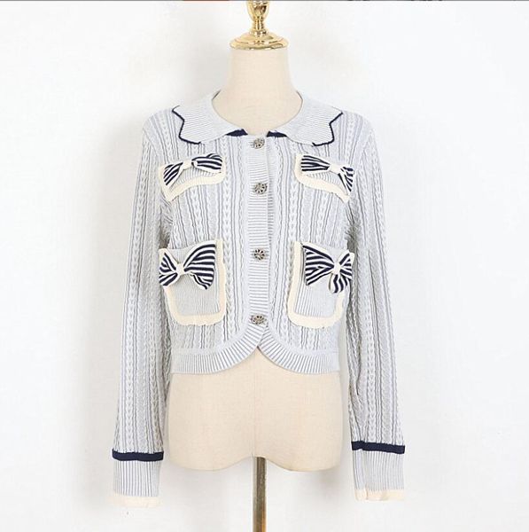autumn winter pocket bow sweater women fashion doll collar long sleeve single breasting cardigan coat femme casual warm w326, White;black
autumn winter pocket bow sweater women fashion doll collar long sleeve single breasting cardigan coat femme casual warm w326, White;black