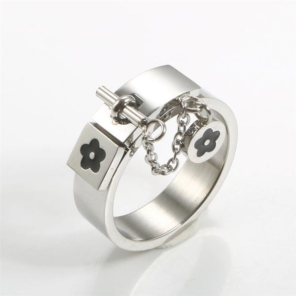 fashion lucky flower charm with chain ring gold sliver stainless steel love promise finger rings for women men jewelry gift2013, Silver
fashion lucky flower charm with chain ring gold sliver stainless steel love promise finger rings for women men jewelry gift2013, Silver