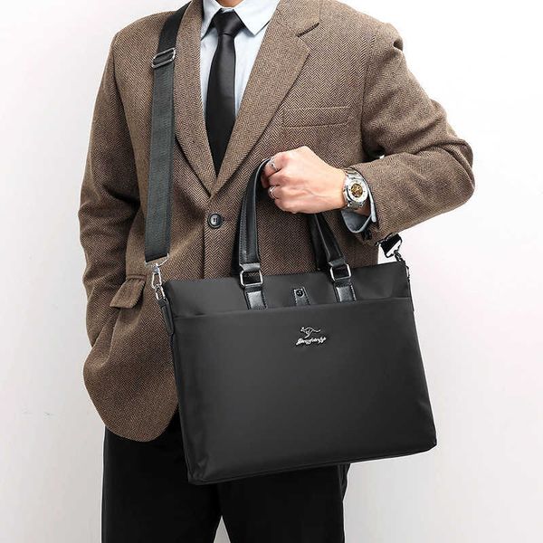 men's briefcase business simple commuting work handbag lightweight large capacity multi-layer handbag 220718
men's briefcase business simple commuting work handbag lightweight large capacity multi-layer handbag 220718