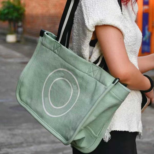 marc totes canvas handbags designer shoulder bag women's large capacity shopping tote bag versatile commuter crossbody purse 220902
marc totes canvas handbags designer shoulder bag women's large capacity shopping tote bag versatile commuter crossbody purse 220902
