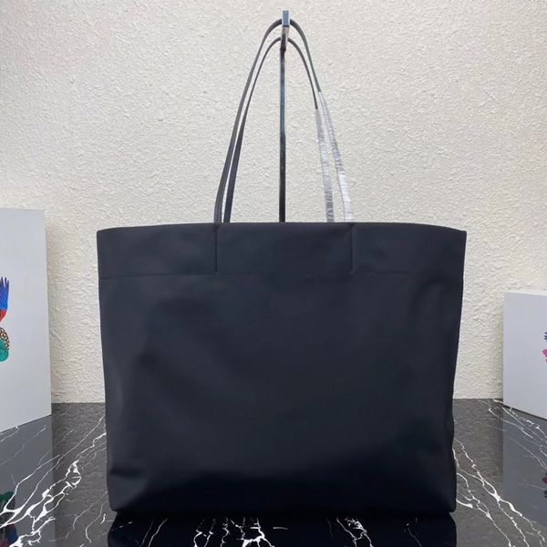 re nylon saffiano leather tote bag enameled metal triangle logo print lining zipper pocket luxury designer shopping handbags travel shoulder
re nylon saffiano leather tote bag enameled metal triangle logo print lining zipper pocket luxury designer shopping handbags travel shoulder