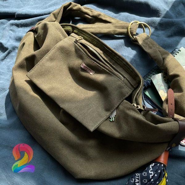 backpack thick canvas hirata kazuhiro large crossbody bag men's women's kapital retro old fashion chest bagbackpack 2208005
backpack thick canvas hirata kazuhiro large crossbody bag men's women's kapital retro old fashion chest bagbackpack 2208005