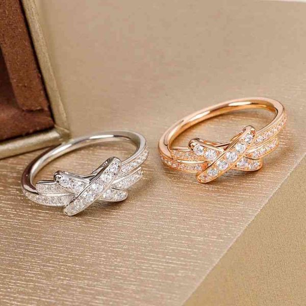 small and luxurious sterling silver fashion wedding ring with diamond cross rose gold simple temperament
small and luxurious sterling silver fashion wedding ring with diamond cross rose gold simple temperament