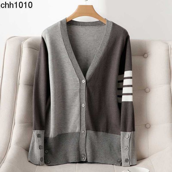 designer college style four bar new loose tb knitted cardigan women's v-neck gray sweater coat in the autumn of 2022, White;black
designer college style four bar new loose tb knitted cardigan women's v-neck gray sweater coat in the autumn of 2022, White;black