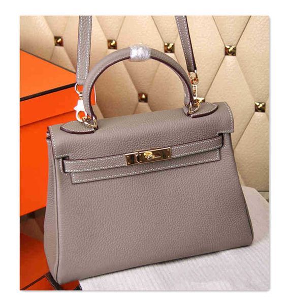 jy0s new leather lychee designer handbag head keilys herme bag in spring and summer of 20214xw1
jy0s new leather lychee designer handbag head keilys herme bag in spring and summer of 20214xw1