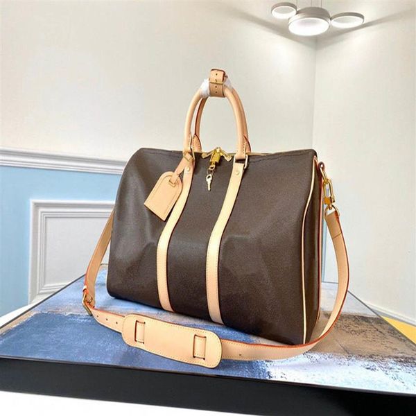55cm leather large capacity women travel bags 2021 quality men shoulder duffel bags carry on luggage bottom rivets with lock 3522
55cm leather large capacity women travel bags 2021 quality men shoulder duffel bags carry on luggage bottom rivets with lock 3522