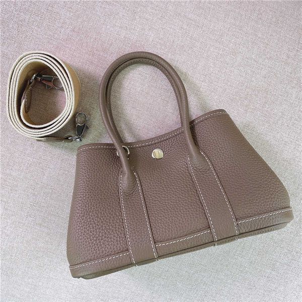 luxurious designer herme bags 2022 new layer cowhide litchi pattern mini garden leather versatile one shoulder messenger portable women'
luxurious designer herme bags 2022 new layer cowhide litchi pattern mini garden leather versatile one shoulder messenger portable women'