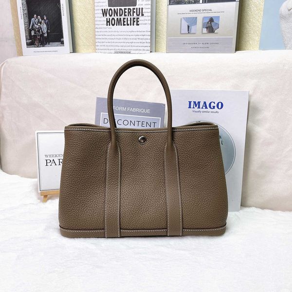 herme bag series designer hand sewn garden with wax thread 30 large capacity tongletuo togo leather
herme bag series designer hand sewn garden with wax thread 30 large capacity tongletuo togo leather