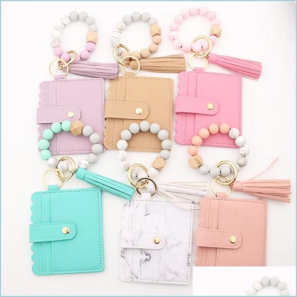 keychains lanyards pu leather bracelet wallet keychain jewelry party favor tassels bangle key ring holder card bag sile beaded wri dhctx, Silver
keychains lanyards pu leather bracelet wallet keychain jewelry party favor tassels bangle key ring holder card bag sile beaded wri dhctx, Silver
