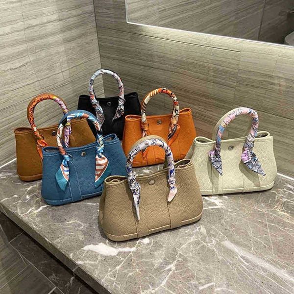 designer handbag shoulder herme crossbody garden 2022 new garden wrap head layer cowhide portable vegetable basket bag mommy tote leather wo
designer handbag shoulder herme crossbody garden 2022 new garden wrap head layer cowhide portable vegetable basket bag mommy tote leather wo