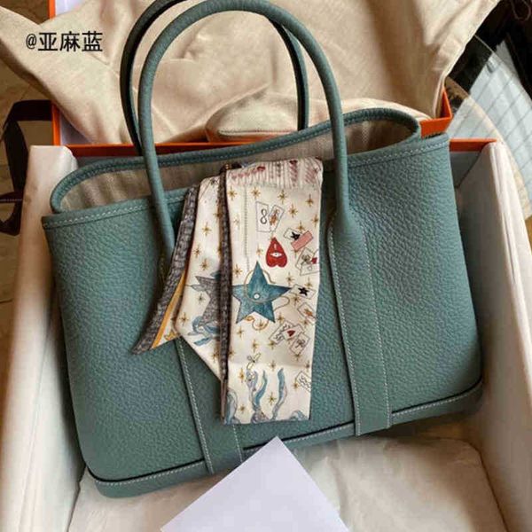 garden party totes herme women designers 2022 new style garden bag fashion large capacity portable single shoulder commuter pattern leather
garden party totes herme women designers 2022 new style garden bag fashion large capacity portable single shoulder commuter pattern leather