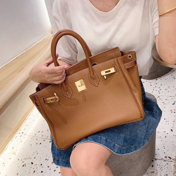 designers handbags h erme birkins bags miss treejunset sign golden brown soft glutinous yuan version cowhide bag with large capacity handbag
designers handbags h erme birkins bags miss treejunset sign golden brown soft glutinous yuan version cowhide bag with large capacity handbag