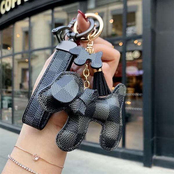 2021 luxury designer keychain dog flower key chain buckle lovers car keychains handmade leather designers keys chains men women bag287p, Silver
2021 luxury designer keychain dog flower key chain buckle lovers car keychains handmade leather designers keys chains men women bag287p, Silver