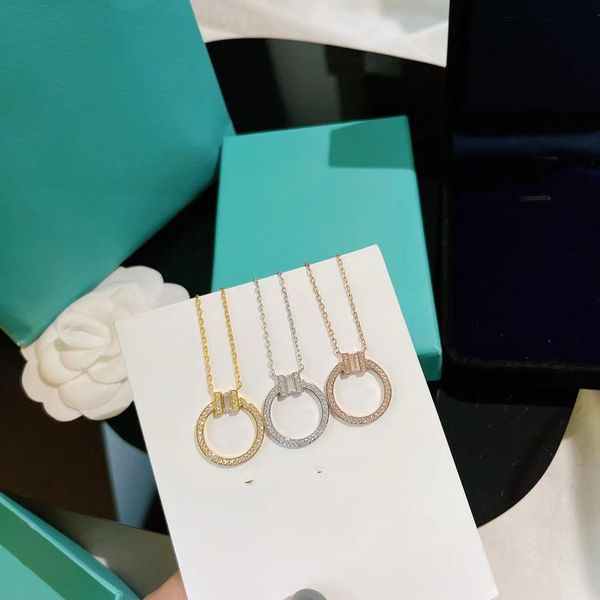 luxury pendnat necklace s925 sterling silver full crystal two designer round circle ring charm short chain choker for women jewelry with box
luxury pendnat necklace s925 sterling silver full crystal two designer round circle ring charm short chain choker for women jewelry with box